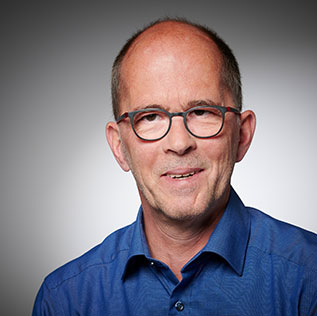 Portrait von Ernst Fischbach, Bereichsleiter Komplettlösungen, Technologie und Vertrieb sowie Prokurist bei SWF Siegen.